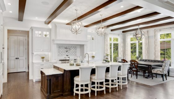 White bar stools at kitchen island